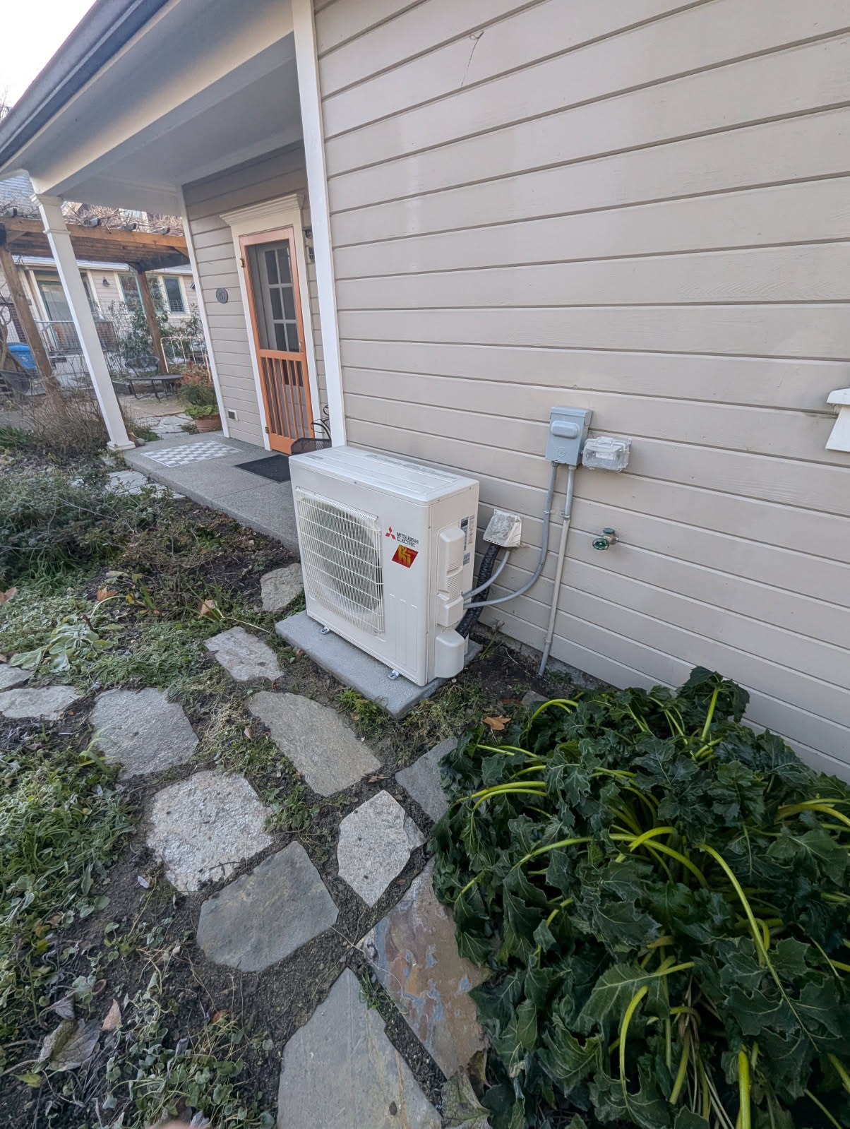 Ductless mini split outdoor unit installed at a Medford home